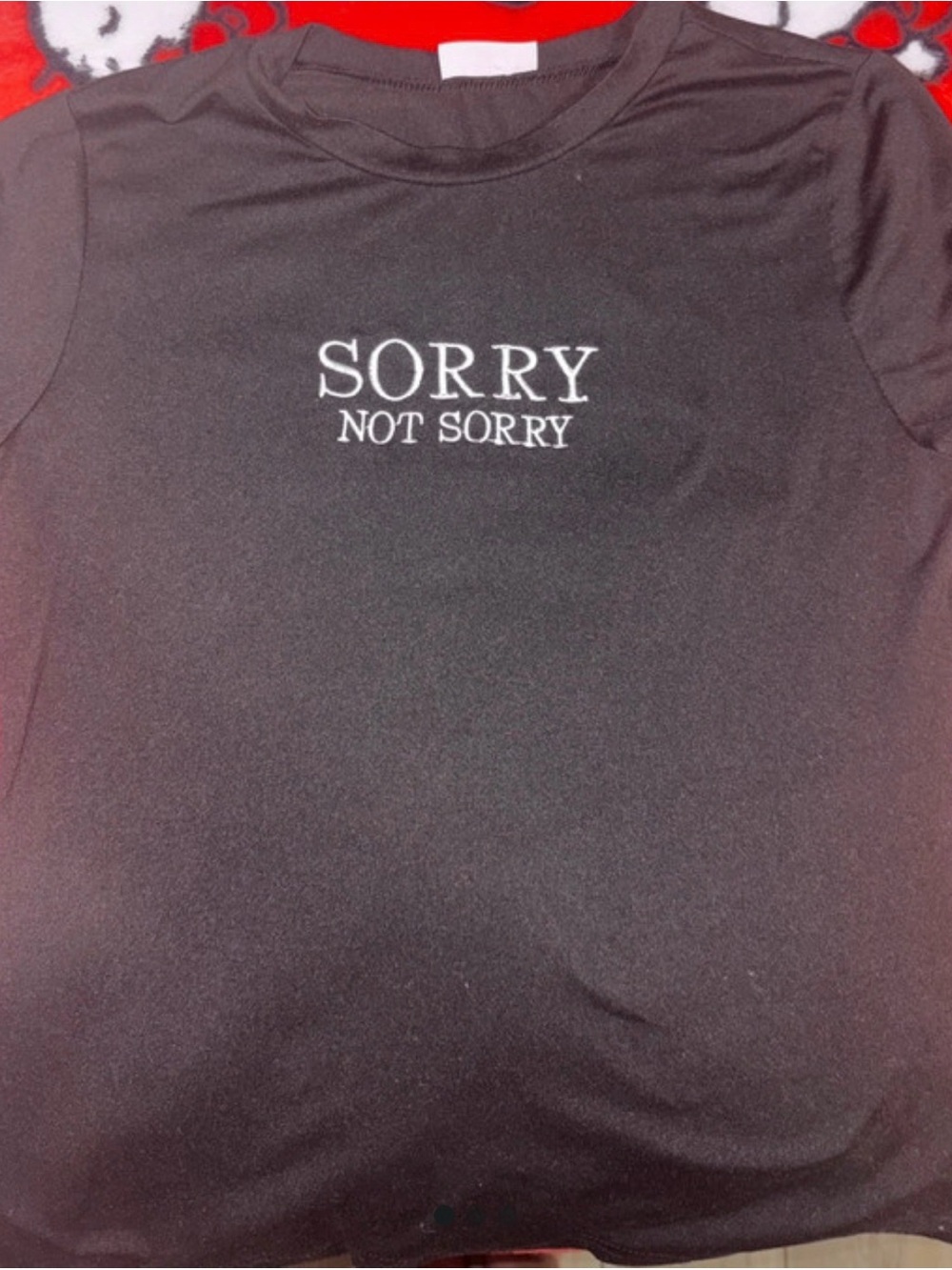 Free Kisses Black Tee with 'SORRY NOT SORRY' White Chest Graphic